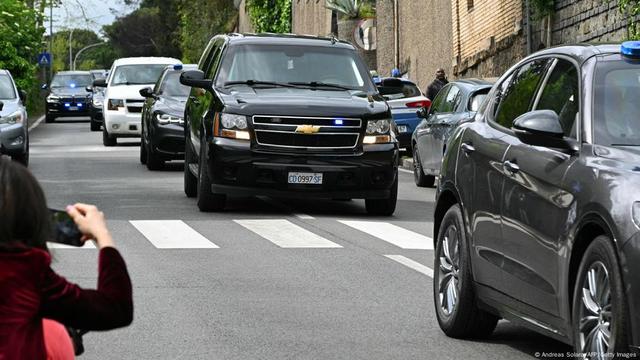 US cars parked outside the venue of talks