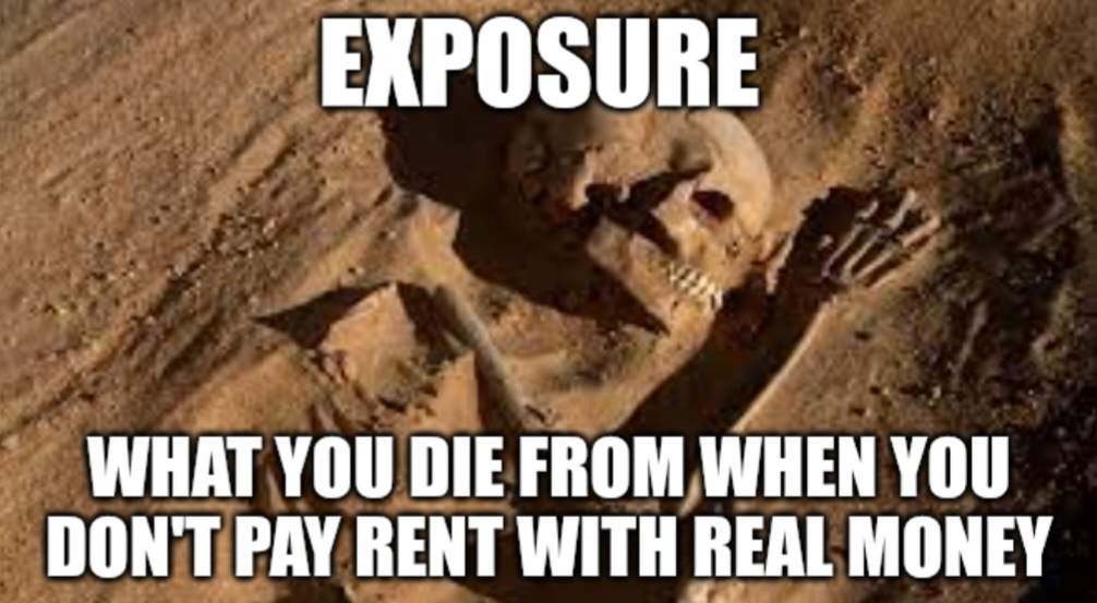 A partially buried skeleton being eroded by the wind. 

Exposure. What you die from when you don't pay rent with real money. 