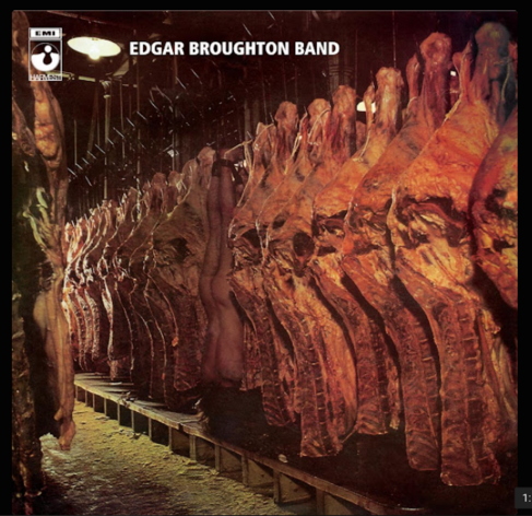 Plattencover. Headline: Edgar Broughton Band.
Foto Rinderhälften hängen an Haken und warten auf die Weiterverarbeitung.