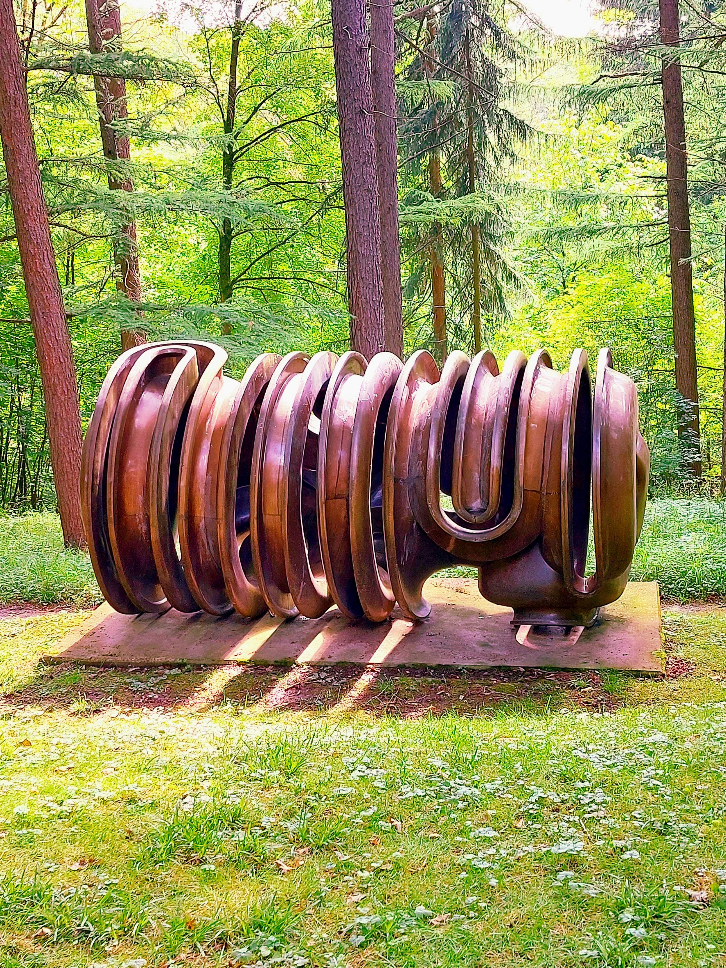 Neatly sliced currywurst, surrounded by trees and grass.

Whoa, easy guys. Don't let this trigger you!